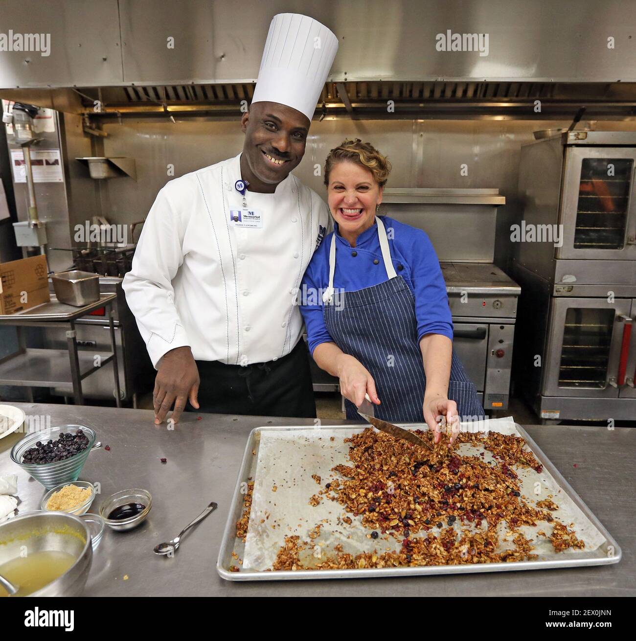 Lydig våben Tradition Memorial Regional Executive Chef Pierre Flerismond, left, and Chef Michelle  Bernstein prepare granola at Memorial Regional Hospital in Hollywood, Fla.,  to create foods for cancer patients. (Photo by Charles Trainor/Miami  Herald/TNS) ***