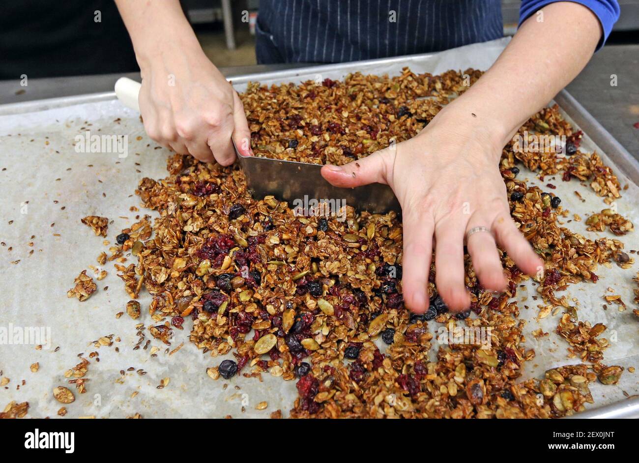 Chef Michelle Bernstein prepares granola for cancer patients at