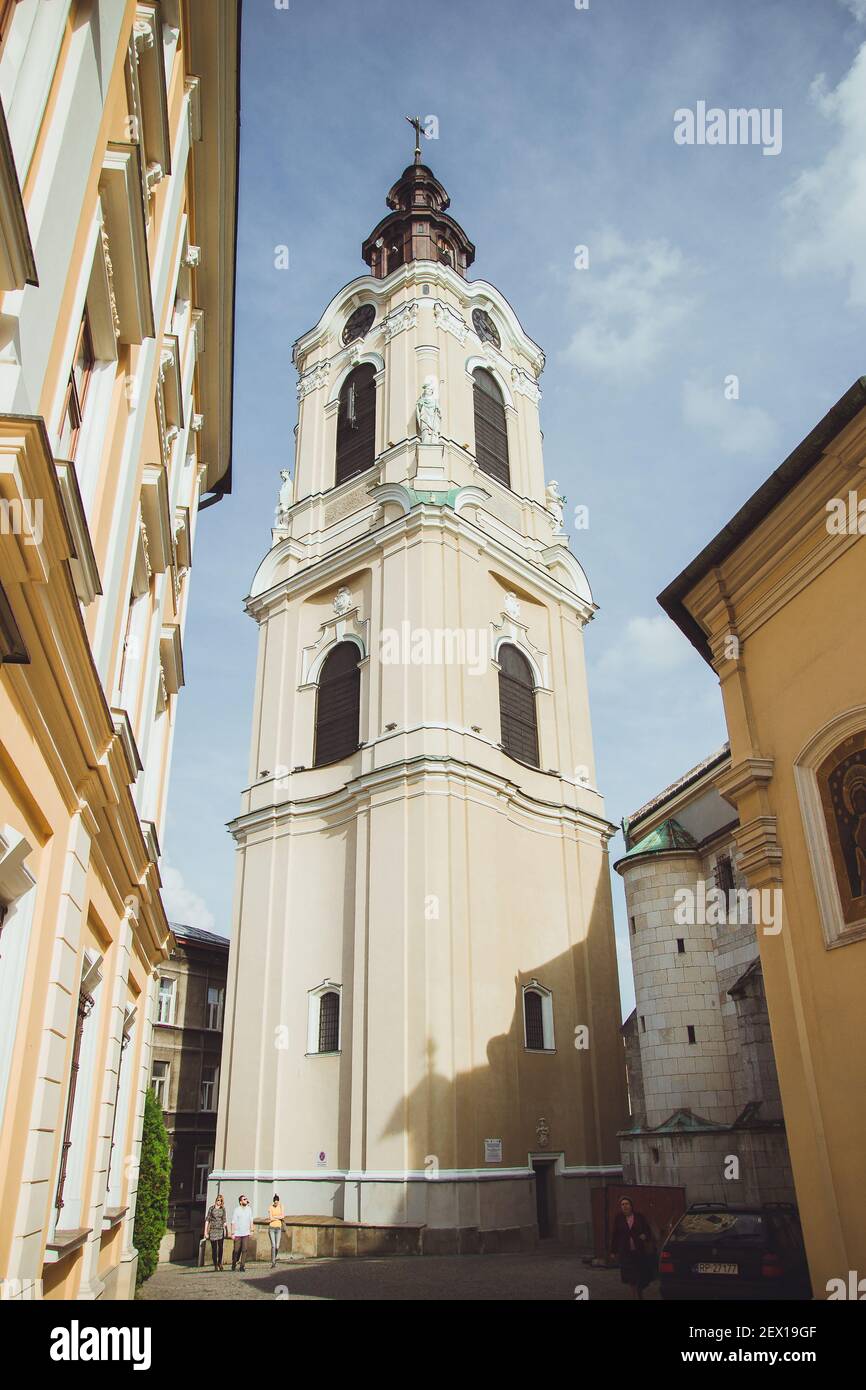 Przemysl, Poland - October, 2016: Clock tower of Cathedral Basilica of Assumption of the Blessed Virgin Mary and St. John the Baptist. It is one of th Stock Photo