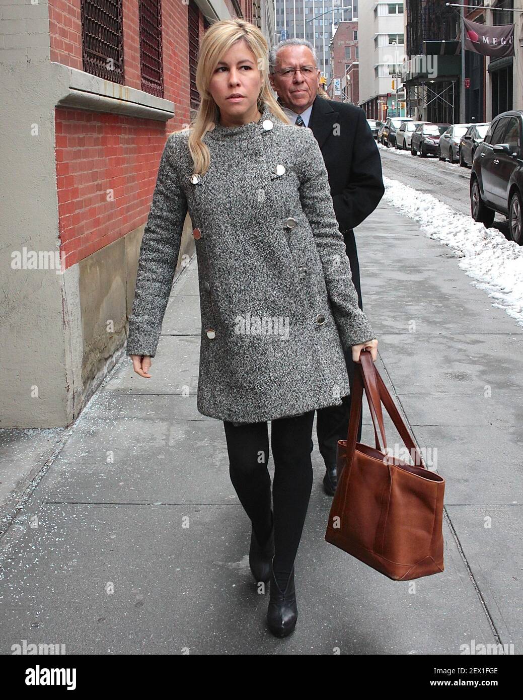 Liza Ghorbani leaves the New York State Supreme Court Civil Branch on