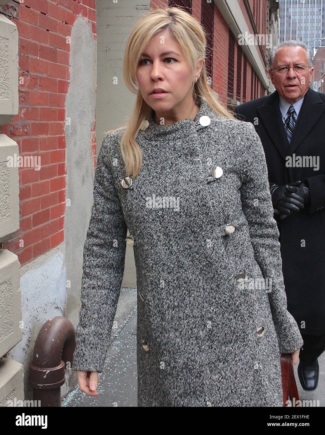 Liza Ghorbani leaves the New York State Supreme Court Civil Branch on