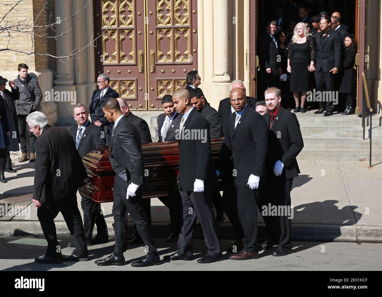 Pallbearers carry out the casket of Chicago White Sox legend Minnie