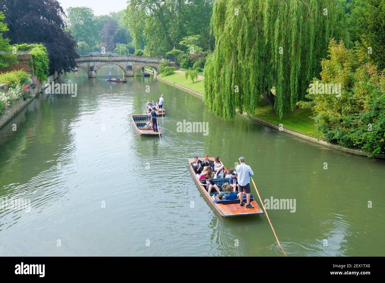 Punting on the river Cam heading towards Trinity College Bridge on a spring day in Cambridge, England, UK Stock Photo
