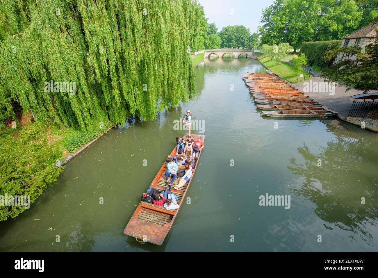 Punting on the river Cam heading towards Trinity College Bridge on a spring day in Cambridge, England, UK Stock Photo