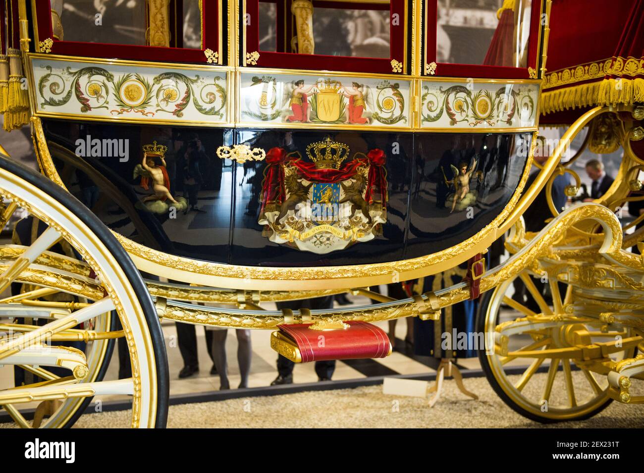King Willem-Alexander of the Netherlands looks at the Louwman Museum's  restored glass coach glazen koets in The Hague, Netherlands on March 16,  2015. The special carriage, the oldest of the royal stable