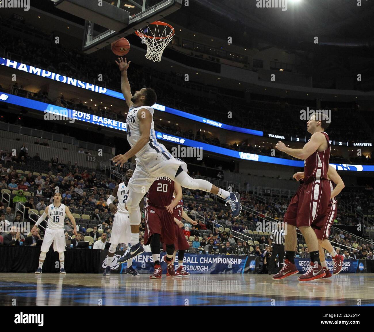 Villanova's Darrun Hillaird puts up a shot past Lafayette's Dan Trist (20) and Bryce Scott during the first half in the second round of the NCAA Tournament at the Consol Energy Center in Pittsburgh on Thursday, March 19, 2015. (Photo by Yong Kim/Philadelphia Daily News/TNS) *** Please Use Credit from Credit Field *** Stock Photo