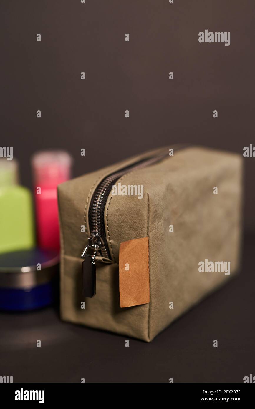 Travel eco paper reusable cosmetic bag with set of colored plastic