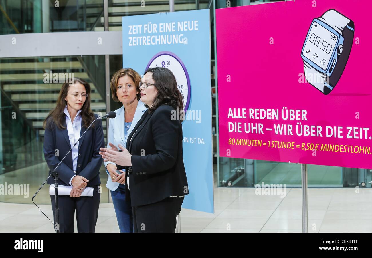 SPD press statement and poster presentation on the topic 'minimum wage ' with Andrea Nahles and Yasmin Fahimi and Malu Dreyer at SPD Headquarter (Willy-Brandt-Haus) in Berlin, Germany on 13 April, 2015. / Picture: Yasmin Fahimi (SPD), SPD General Secretary, and â€žMaluâ€œ Dreyer (SPD), Minister-President of the state of Rhineland-Palatinate, and Andrea Nahles (SPD), German Minister of Labour. *** Please Use Credit from Credit Field *** Stock Photo