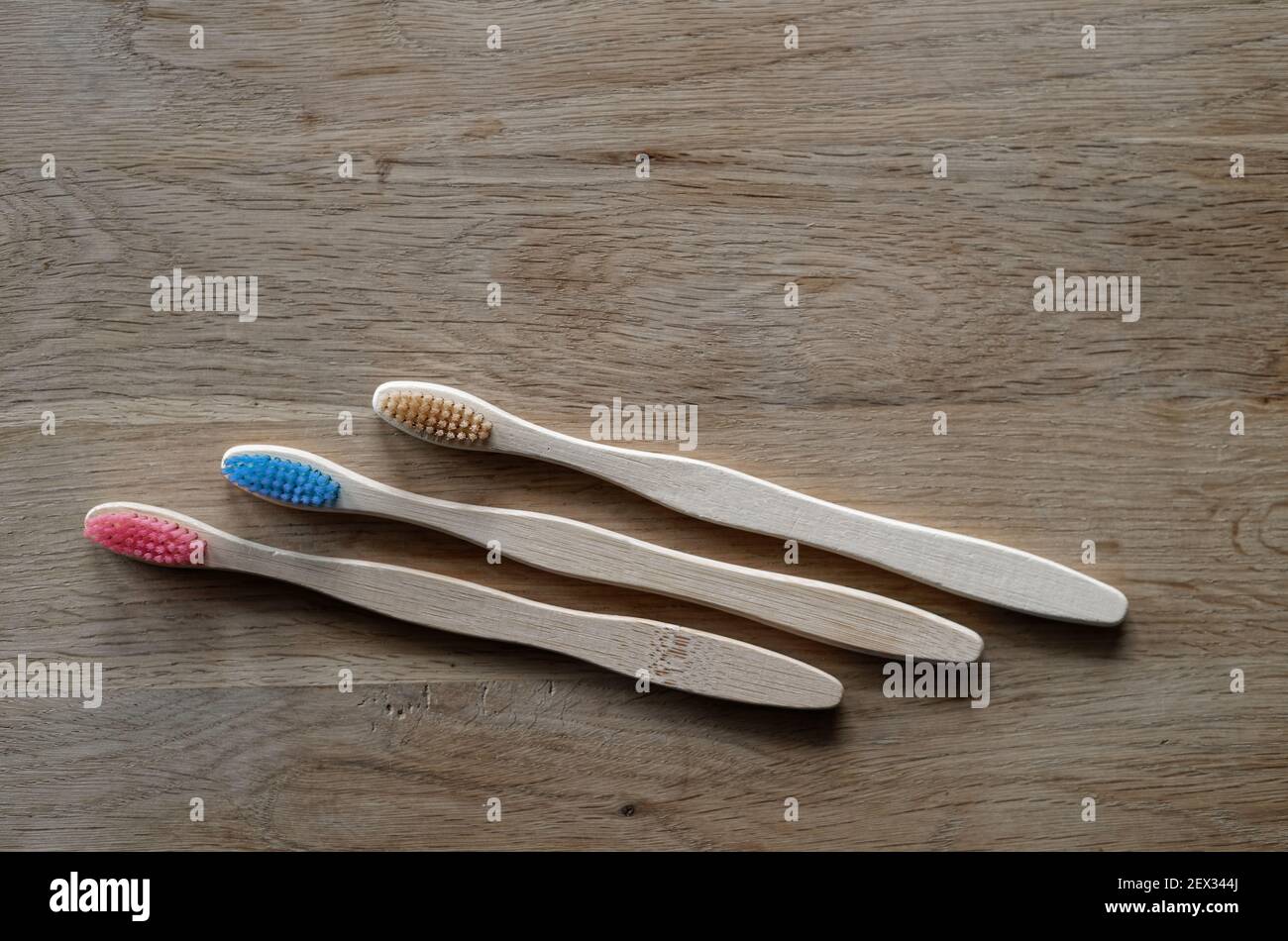 A top view of eco-friendly bamboo toothbrushes Stock Photo - Alamy