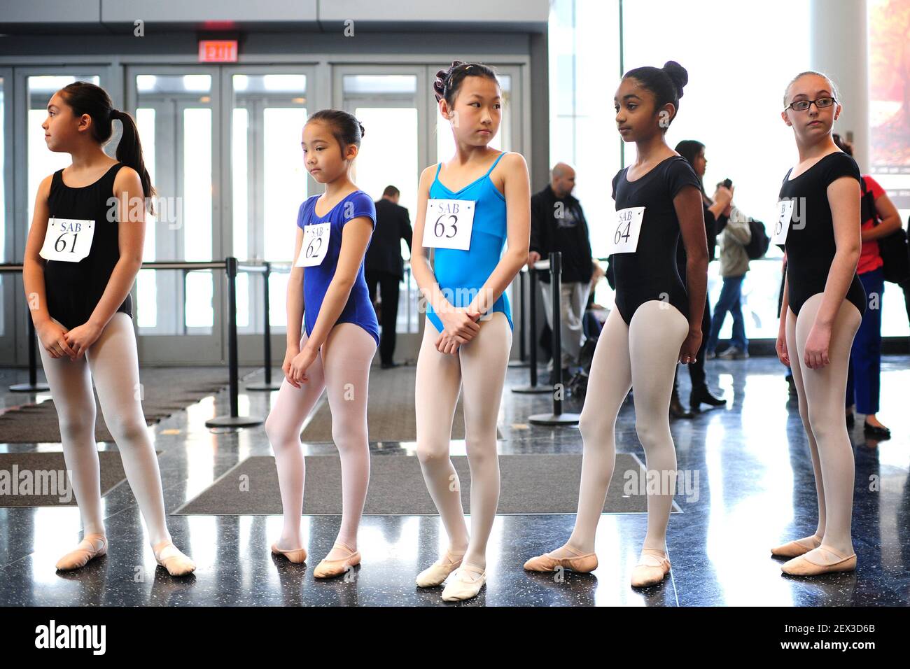 Five young girls wait in line to go auditioning for the School of American  Ballet (SAB), in the New York Borough of Queens, NY, on April 19, 20155.  With no previous dance