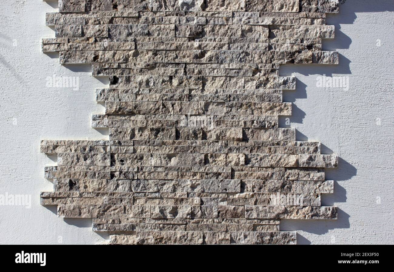 Decorative stone garden wall texture background Stock Photo - Alamy