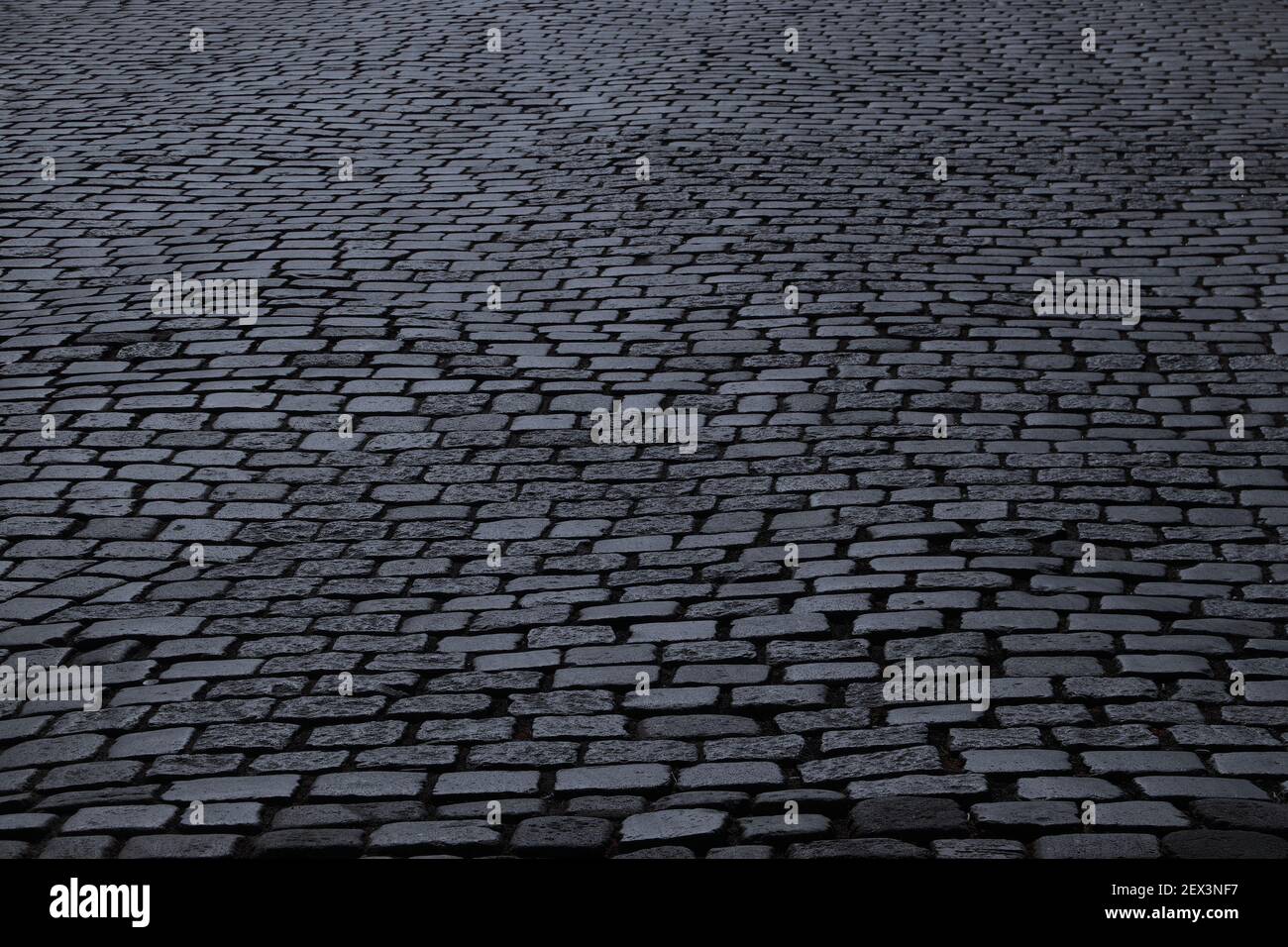 Night cobblestone street in Germany. Cobblestone Europe. Stone paved