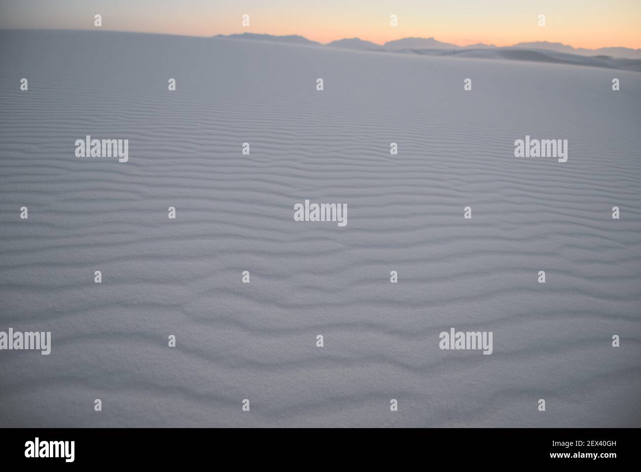 The sun sets over the gypsum dunes at White Sands National Monument