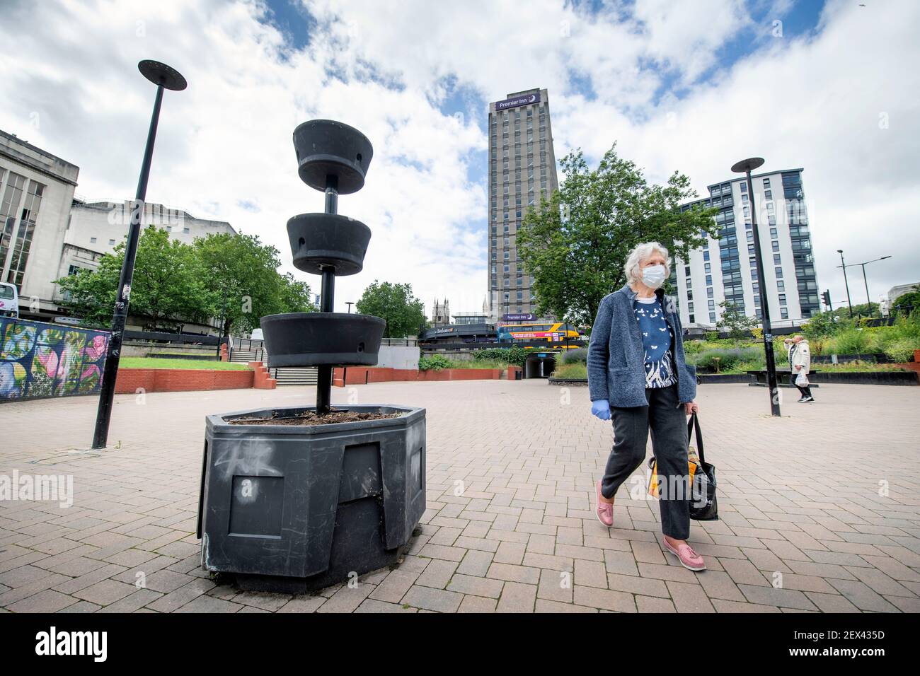 A pensioner crosses the Bearpit St James Barton roundabout underpass during the Covid-19 pandemic in the city of Bristol, UK Stock Photo