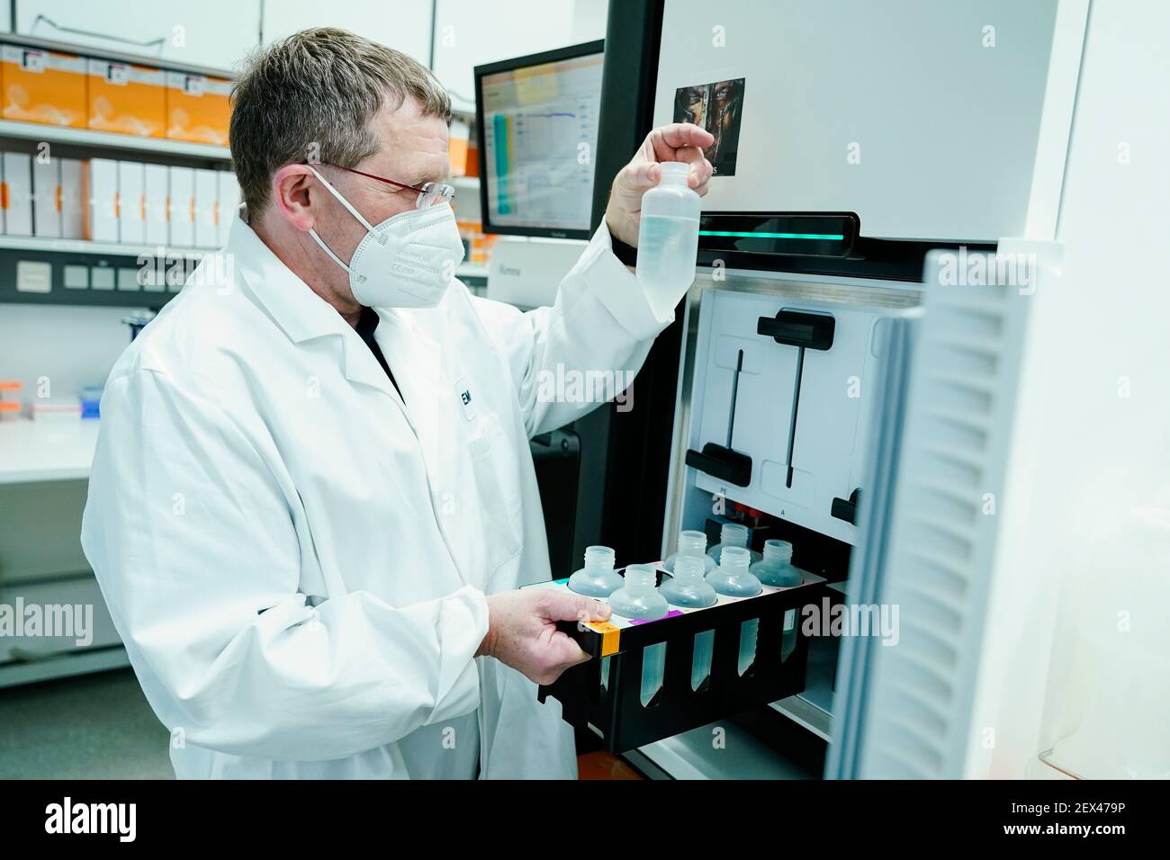 Heidelberg Germany 04th Mar 2021 Vladimir Benes Head Of Genomics Core Facility Takes A Container Out Of A Cabinet In A Sequencing Laboratory At The European Molecular Biology Laboratory Embl In The