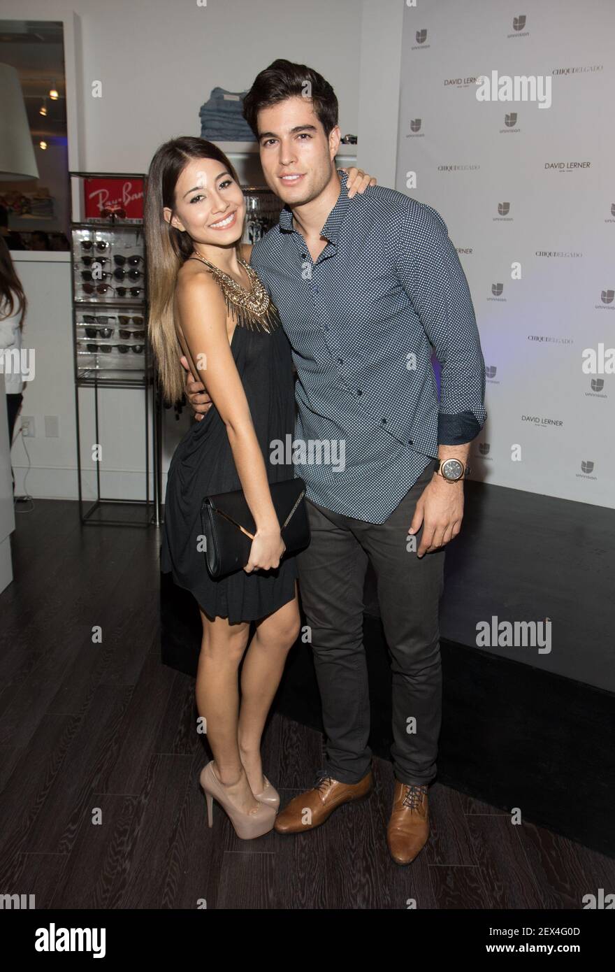 MIAMI, FL - MAY 07: Angela Rincon and Danilo Carrera are seen during the  launch of Chiqui Delgado collection for David Lerner NY on May 7, 2015 in  Miami, Fl. (Photo by