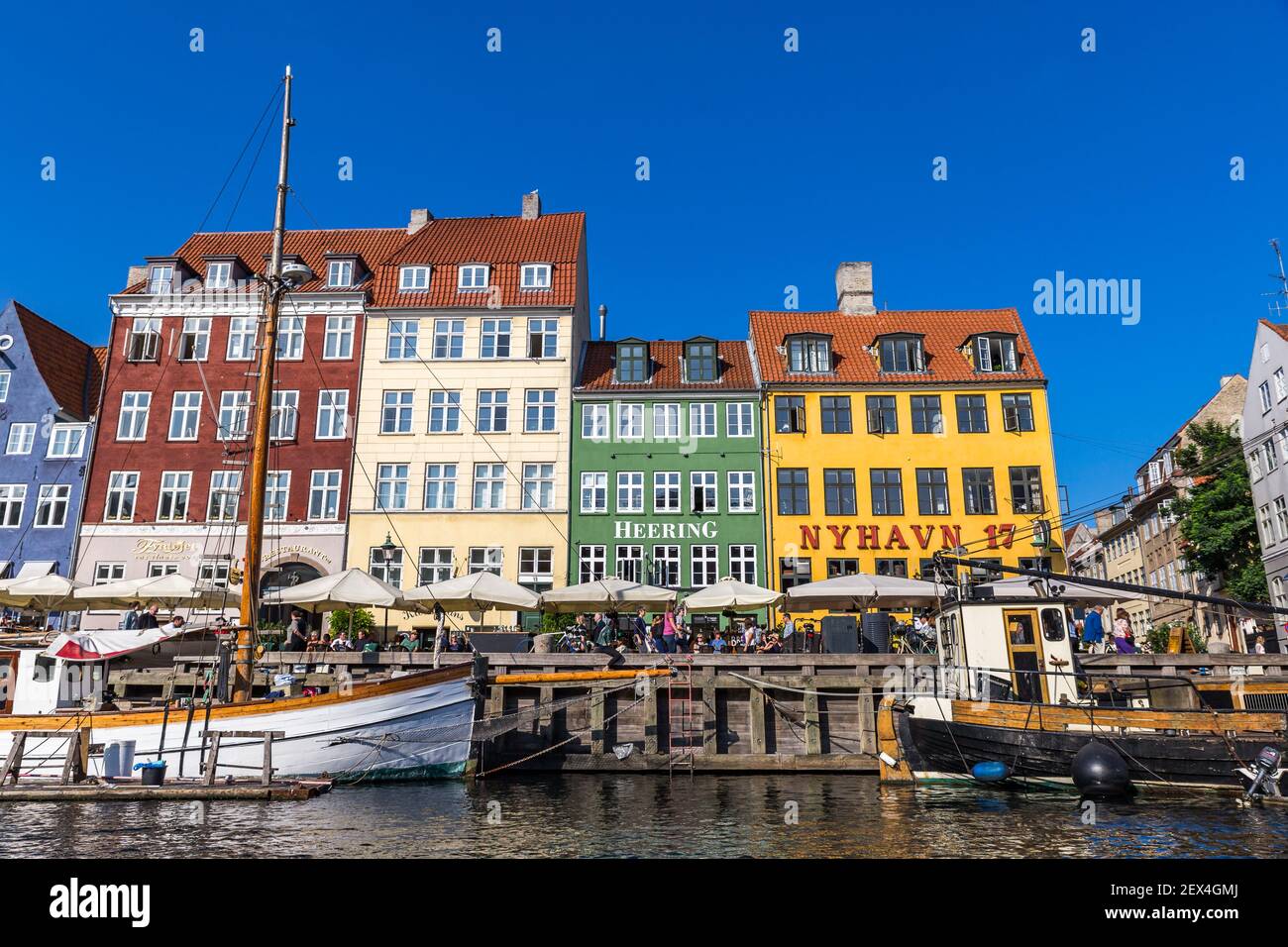 Copenhagen, Denmark - September 18, 2018: Cityscape of Nyhavn Pier with Colorful Buildings and Ships, Europe Stock Photo