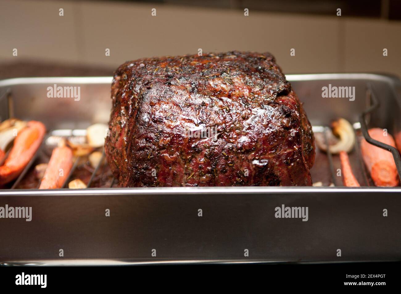 herb and spice rubbed beef rib roast fresh from the oven Stock Photo