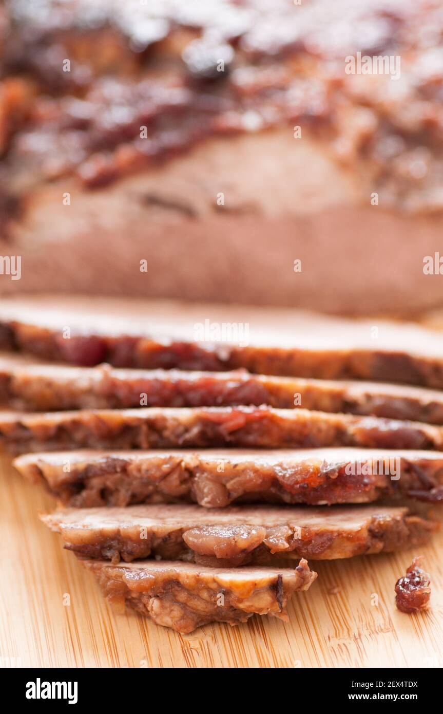 braised brisket made for Passover feast holiday with craberry topping Stock Photo