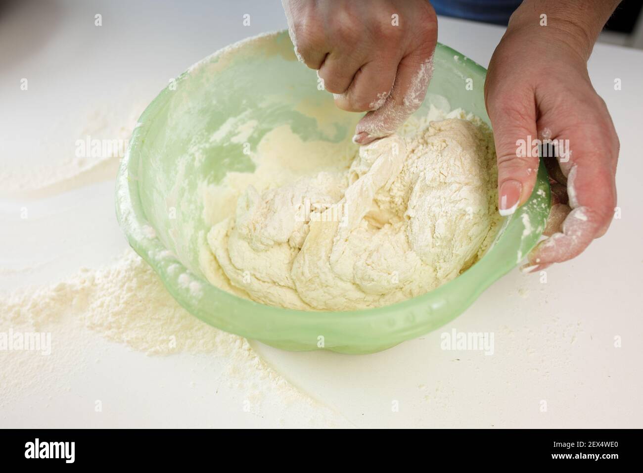 homemade dumplings in the kitchen without decorations. making dumplings with minced pork, beef and chicken Stock Photo