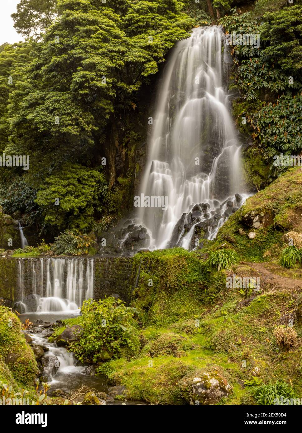 Wonderful waterfall at Nordeste, Azores travel destination, Sao Miguel island. Stock Photo