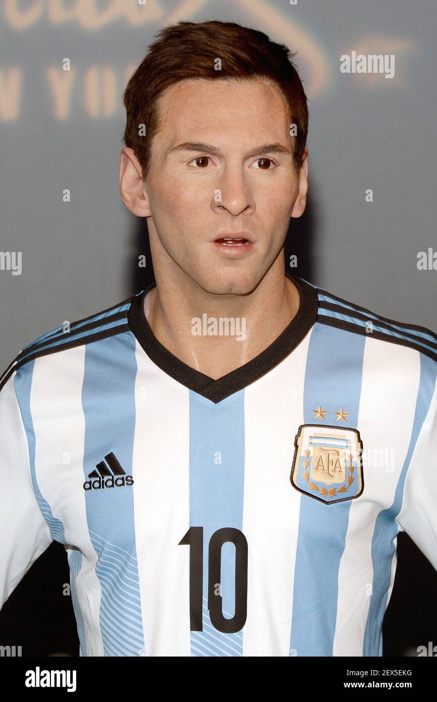 The mid-kick action pose of Lionel Mess wax figure, Argentinian  professional soccer player wearing his #10 team jersey from the 2014 FIFA  World Cup games, is unveiled at Madame Tussauds New York