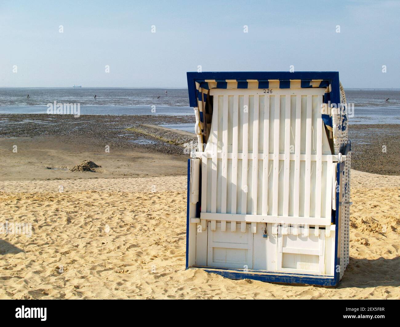 Beach Chair at the Tidal Flat, Germany Stock Photo