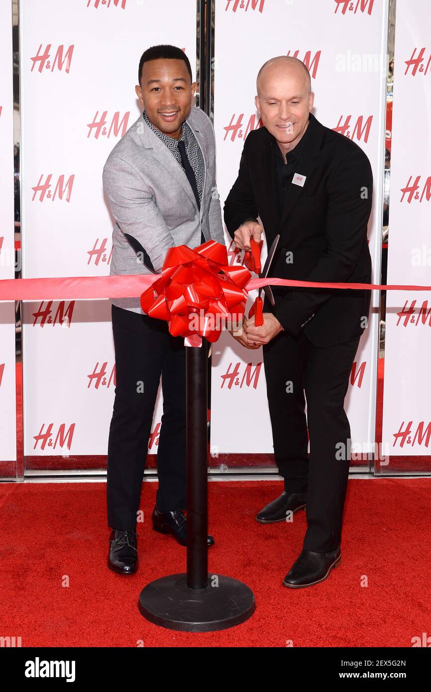 L-R) Musician John Legend and H&M president Daniel Kulle cut the ribbon for  the H&M Herald Center Flagship Store opening in New York, NY, on May 20,  2015. (Photo by Anthony Behar) ***