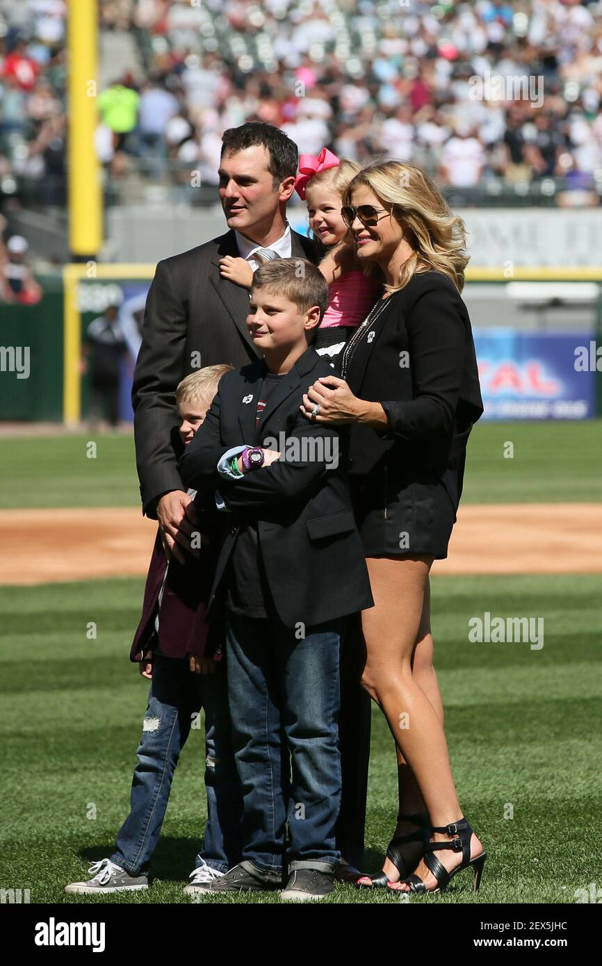 The Konerko family including, Paul and Jennifer, and their children Nick,  Owen and Amelia, during a ceremony to retire his uniform number prior to a  game against the Minnesota Twins at U.S.