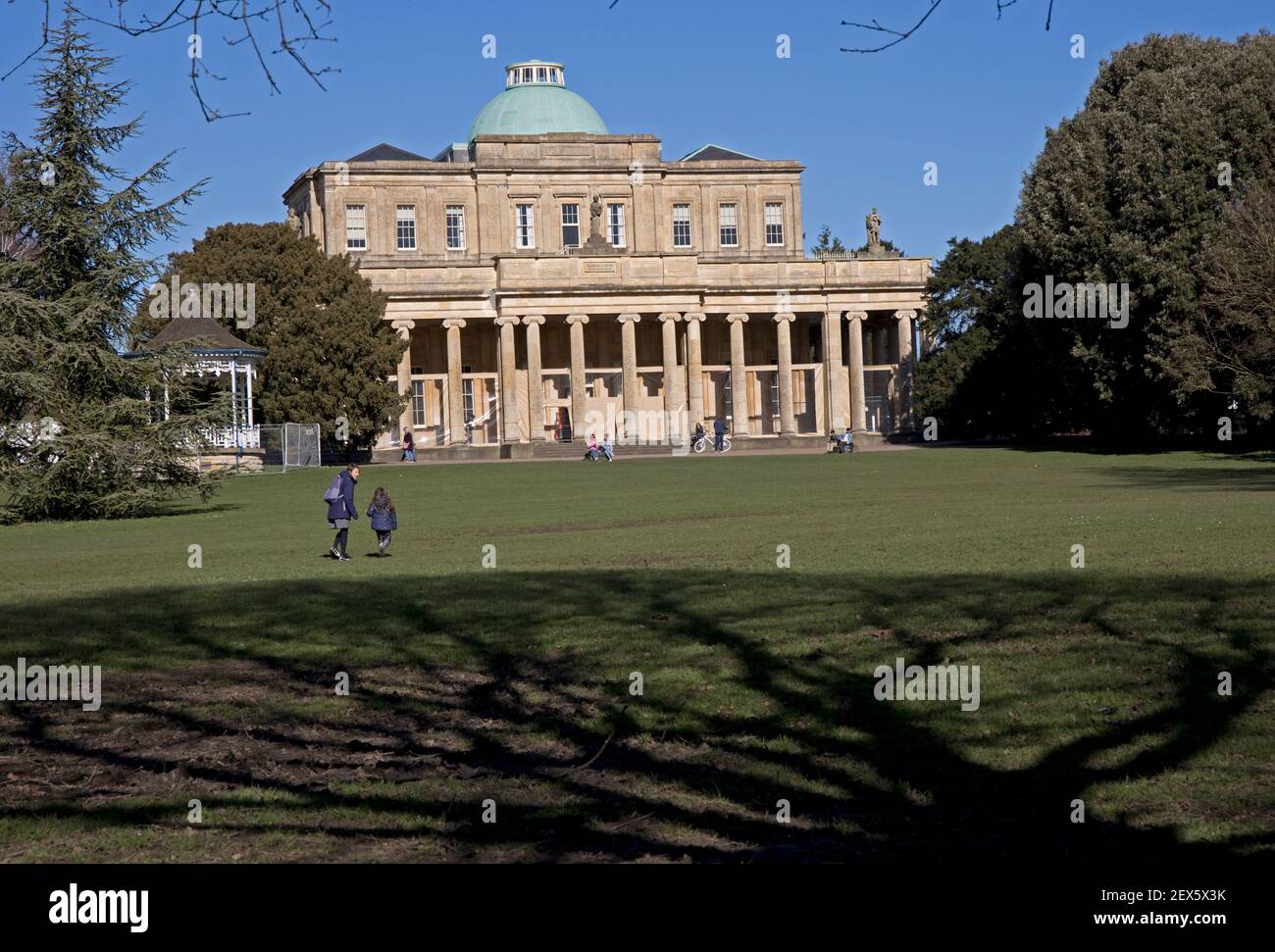 Pittville Puimp Rooms in Pittville Park Cheltenham the largest spa for mineral waters in Cheltenham opened in 1830 taken on a sunny day at the end of Stock Photo