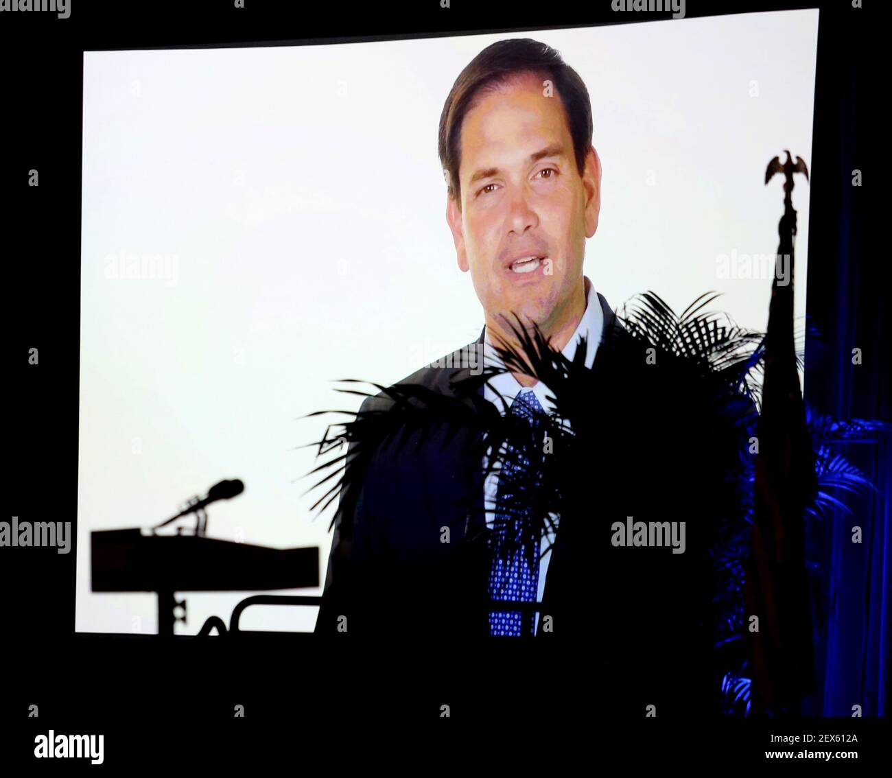 An empty podium is seen in the foreground as GOP presidential contender Sen. Marco Rubio delivers remarks via teleconference during Florida Gov. Rick Scott's Economic Growth Summit on Tuesday, June 2, 2015, at the Yacht & Beach Club Convention Center at Walt Disney World in Lake Buena Vista, Fla. Rubio had to cancel his appearance due to U.S. Senate business. (Photo by Joe Burbank/Orlando Sentinel/TNS) *** Please Use Credit from Credit Field *** Stock Photo