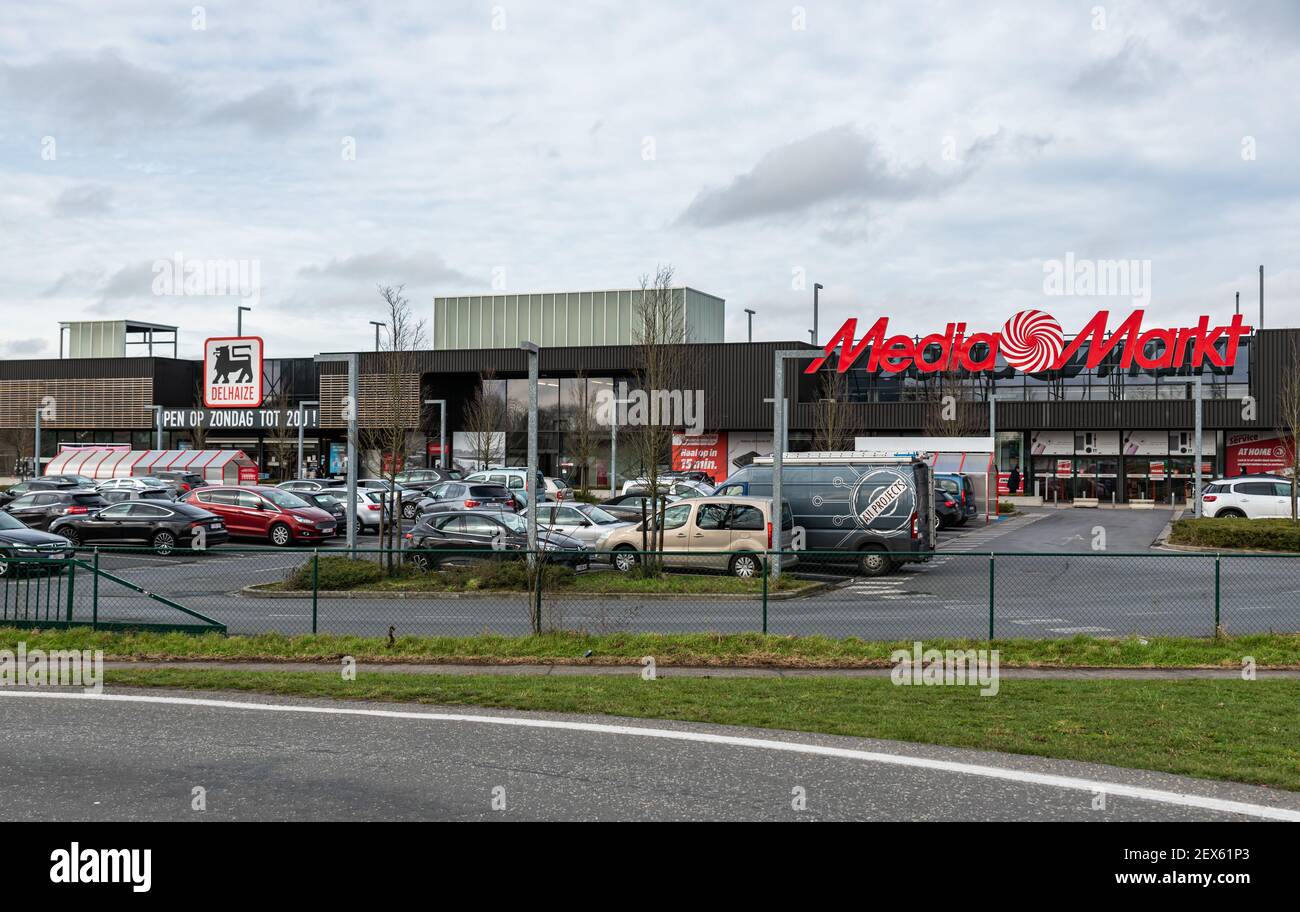 Ghent, Flanders, Belgium - 02 20 2021: The Mediamarkt and Delhaize retail  shops and parking Stock Photo - Alamy