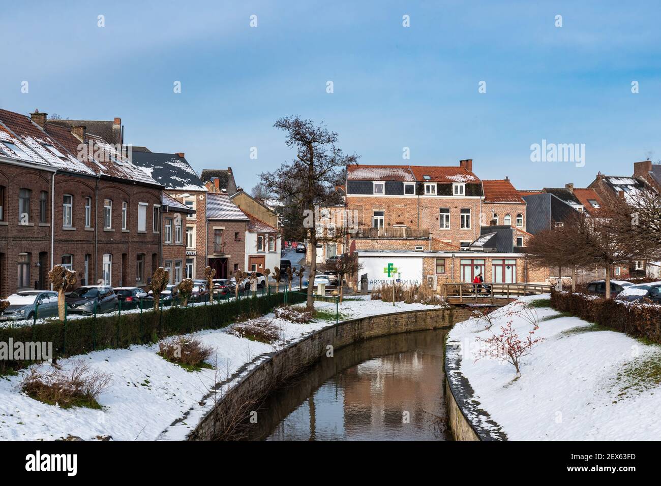 Jodoigne, Wallonia - Belgium - 01 23  2021: Scenic view over the Gete river reflecting Old Town buildings Stock Photo