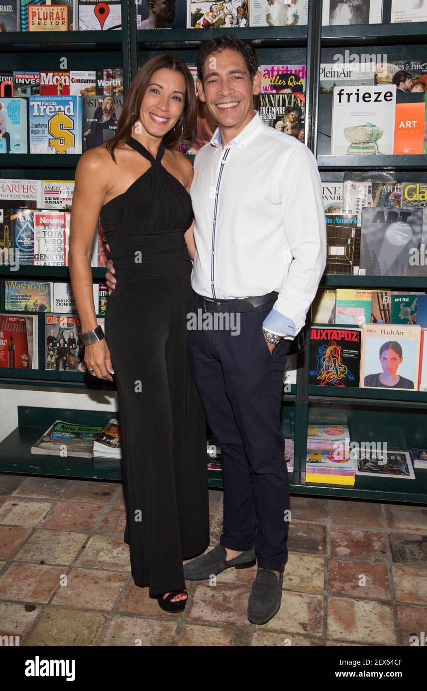 CORAL GBLES, FLORIDA - JUNE 4: Sandy Melendez and Johnny Lozada are seen  during Laura Posada Book signing in Coral Gables, Florida. (Photo by  Alberto E. Tamargo) *** Please Use Credit from