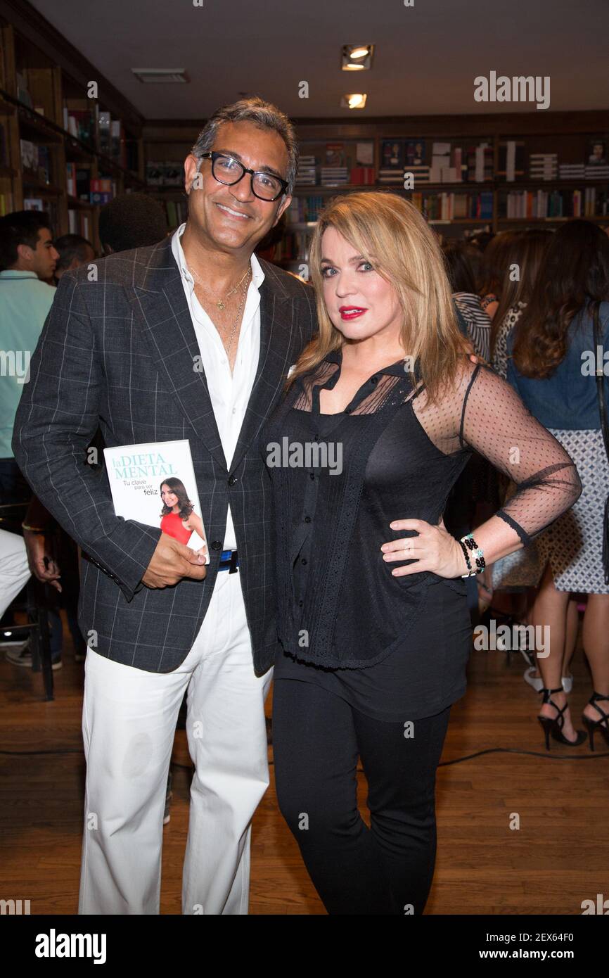 CORAL GBLES, FLORIDA - JUNE 4: Dr. Jhonny Salomon and Ednita Nazario are  seen during Laura Posada Book signing in Coral Gables, Florida. (Photo by  Alberto E. Tamargo) *** Please Use Credit