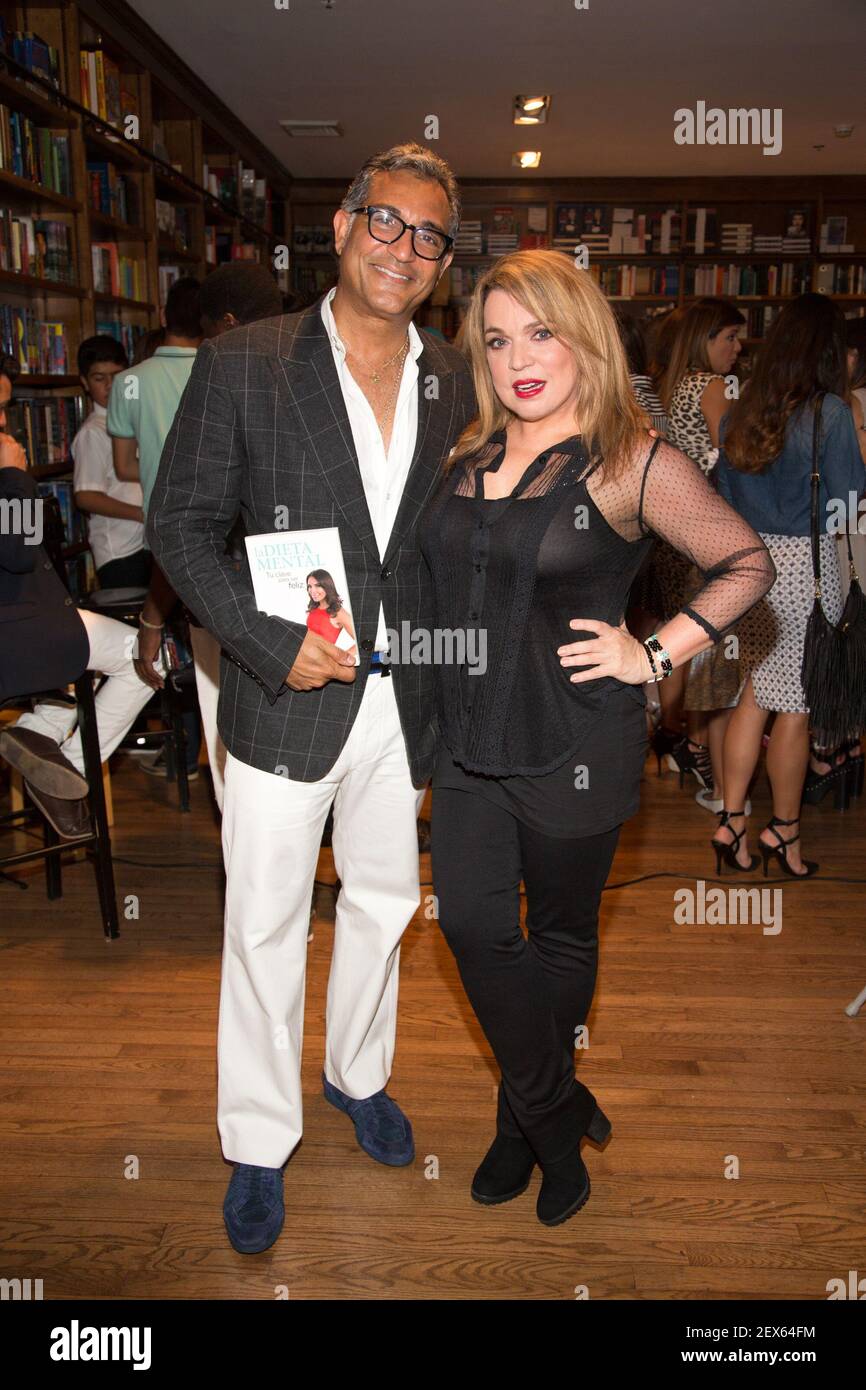 CORAL GBLES, FLORIDA - JUNE 4: Dr. Jhonny Salomon and Ednita Nazario are  seen during Laura Posada Book signing in Coral Gables, Florida. (Photo by  Alberto E. Tamargo) *** Please Use Credit