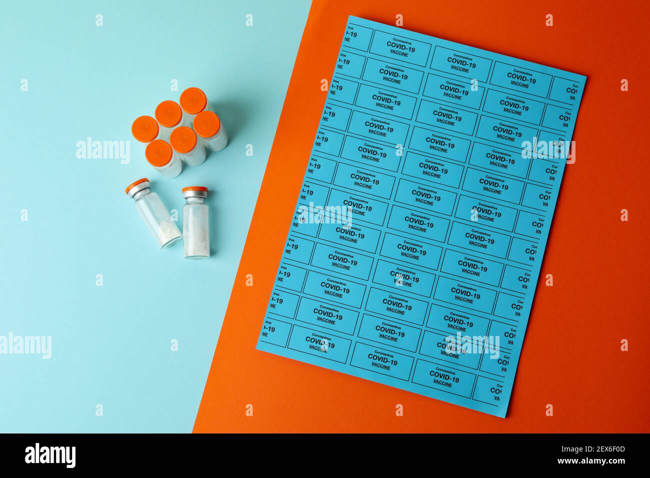 Vials of powder Covid - 19 vaccine on two tone background Stock Photo ...