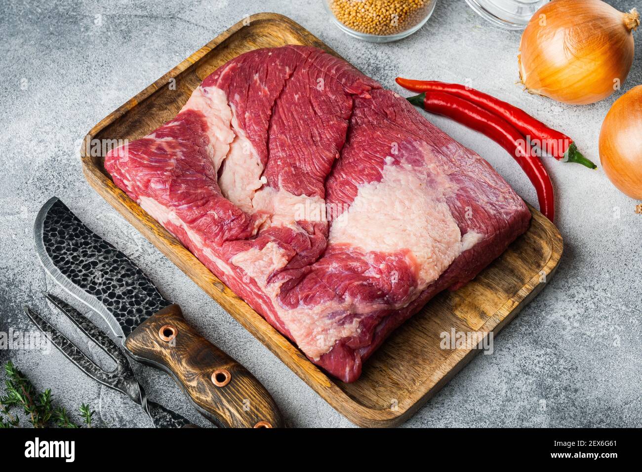 Raw brisket, beef brisket meat set,with ingredients for smoking making