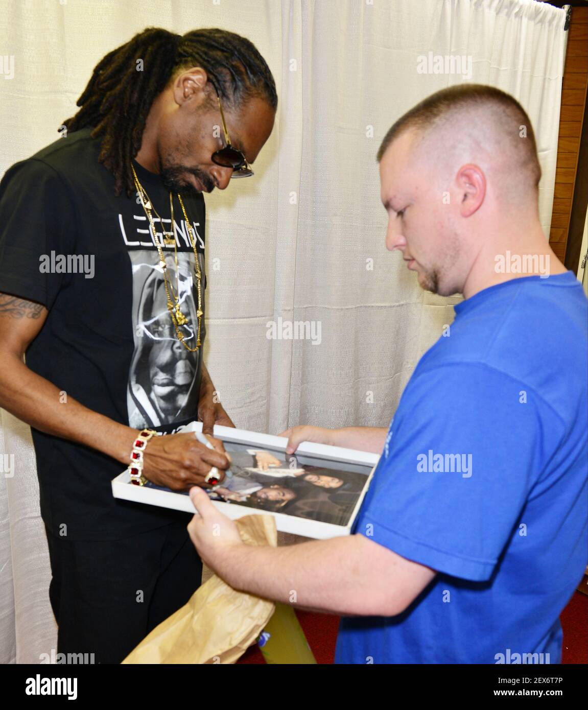 Snoop Dogg attends a meet and greet and partnership celebration with
