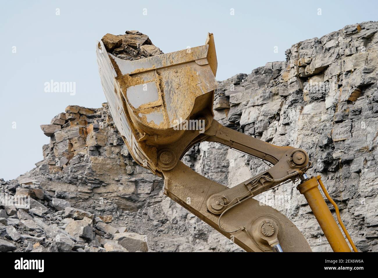 03 March 2021, Baden-Wuerttemberg, Nußloch: A wheel loader transports limestone in the quarry of the HeidelbergCement building materials group. Photo: Uwe Anspach/dpa Stock Photo
