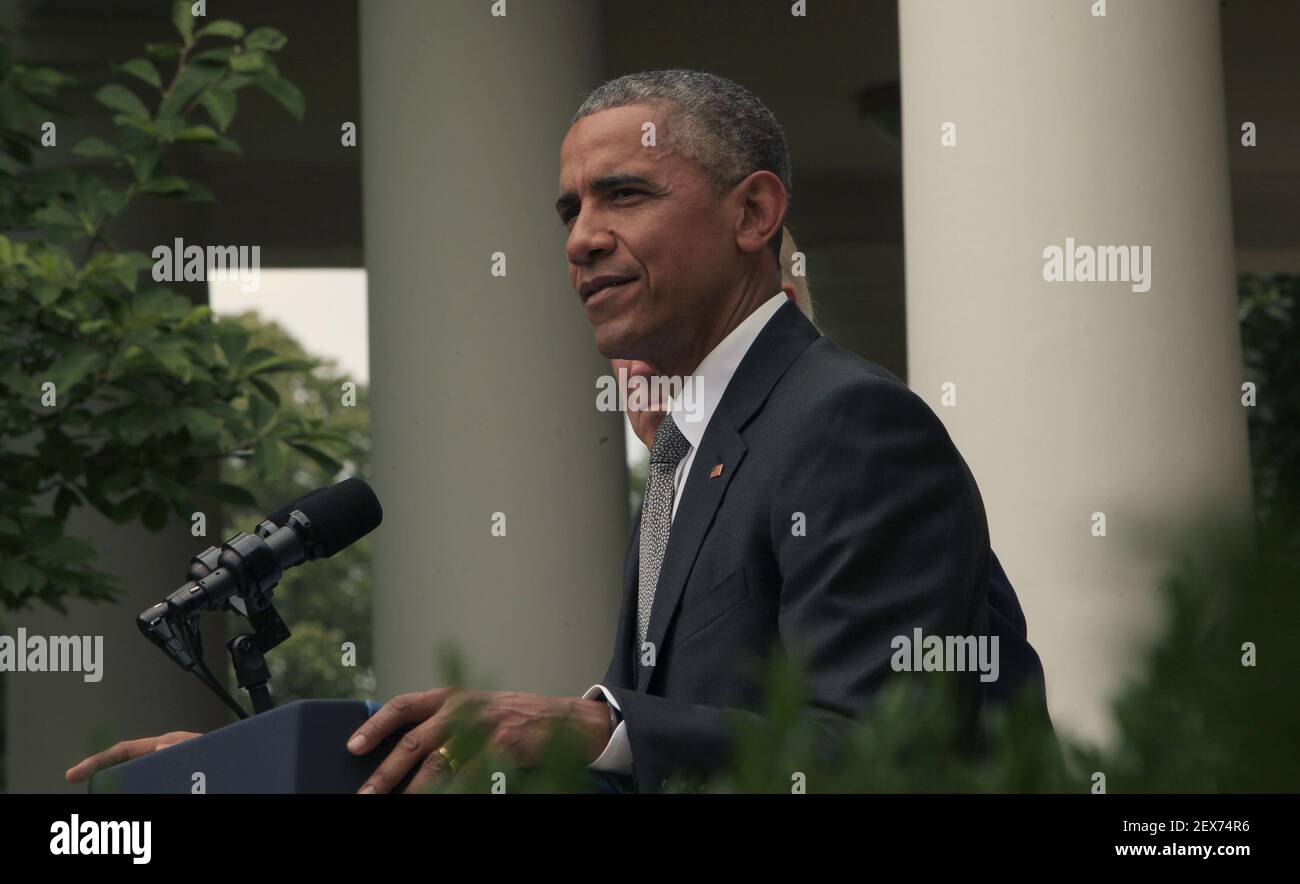 President Barack Obama with Vice President Biden by his side delivers a statement on today's Affordable Care Act ruling from the Supreme Court in the Rose Garden of the White House on June 25,2015 ISP photo by Dennis Brack/Black Star *** Please Use Credit from Credit Field *** Stock Photo