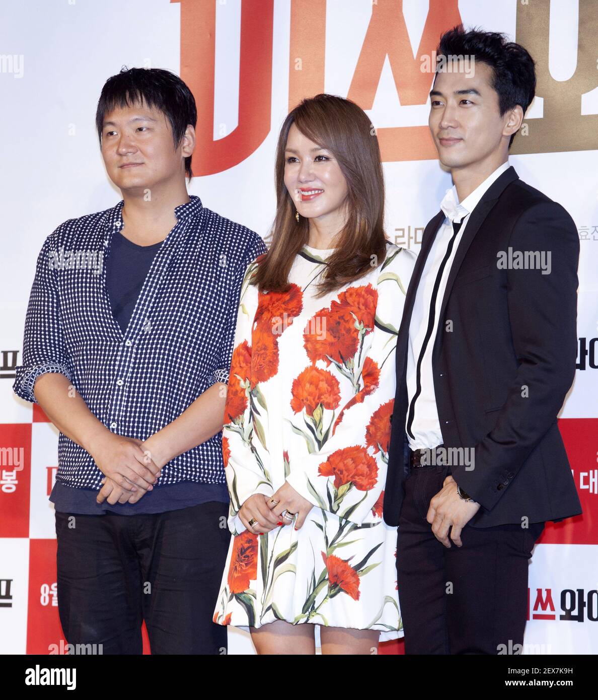 13 July 2015 - Seoul, South Korea : (L to R)) South Korean director Kang  Hyo-Jin, actress Uhm Jung-Hwa and actor Song Seung-Heon, attend a photo  call for the new film â€œMiss