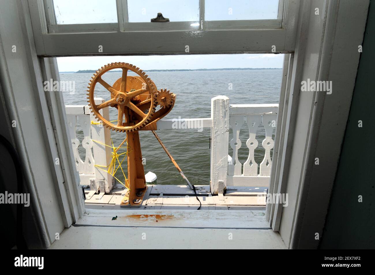 A wench is pictured on the firstlevel wraparound porch of the Thomas