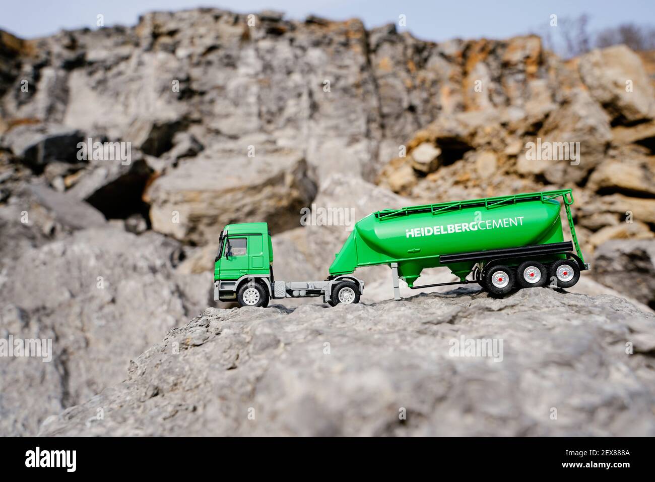 ILLUSTRATION - 03 March 2021, Baden-Wuerttemberg, Nußloch: The model of a cement truck stands on demolition material in the quarry of the HeidelbergCement building materials group. Photo: Uwe Anspach/dpa Stock Photo