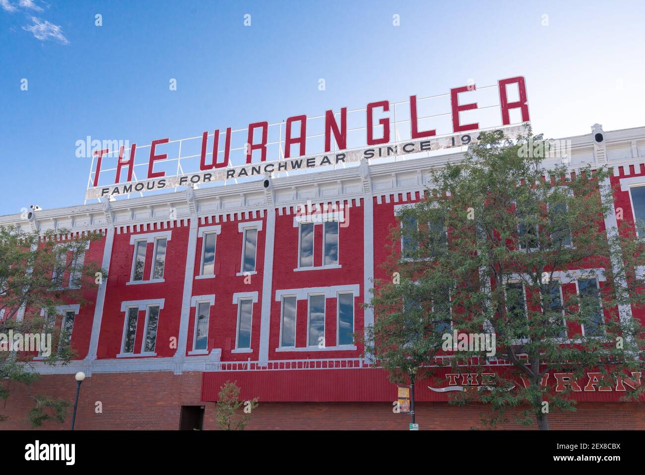 CHEYENNE, Wyoming - APRIL 27, 2018: Sign on top of The Wrangler in historic  downtown Cheyenne Wyoming. The three story red-painted brick building domi  Stock Photo - Alamy