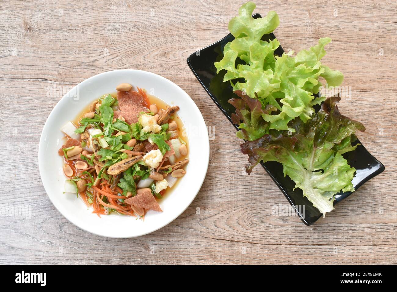 crispy fish with pork couple maw topping peanut in spicy and sour chili