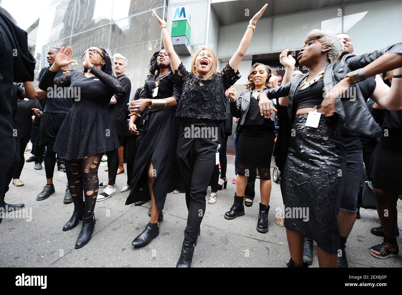 H&M Team members dance in celebration before the ceremony for the opening  of the H&M Herald Center Flagship Store in New York, NY, on May 20, 2015.  (Photo by Anthony Behar) ***