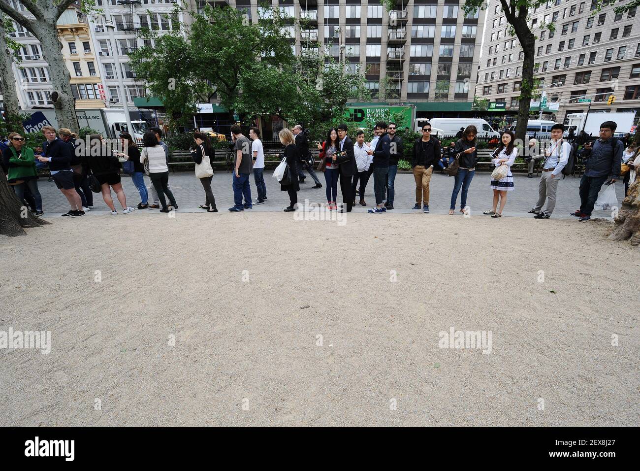 A long line of customers wait to place their orders as Shake Shack
