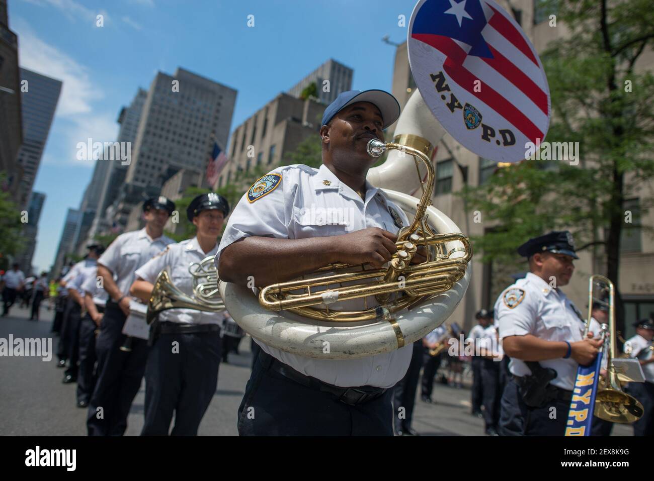 New York Police Department band member Tony Stewart plays the tuba