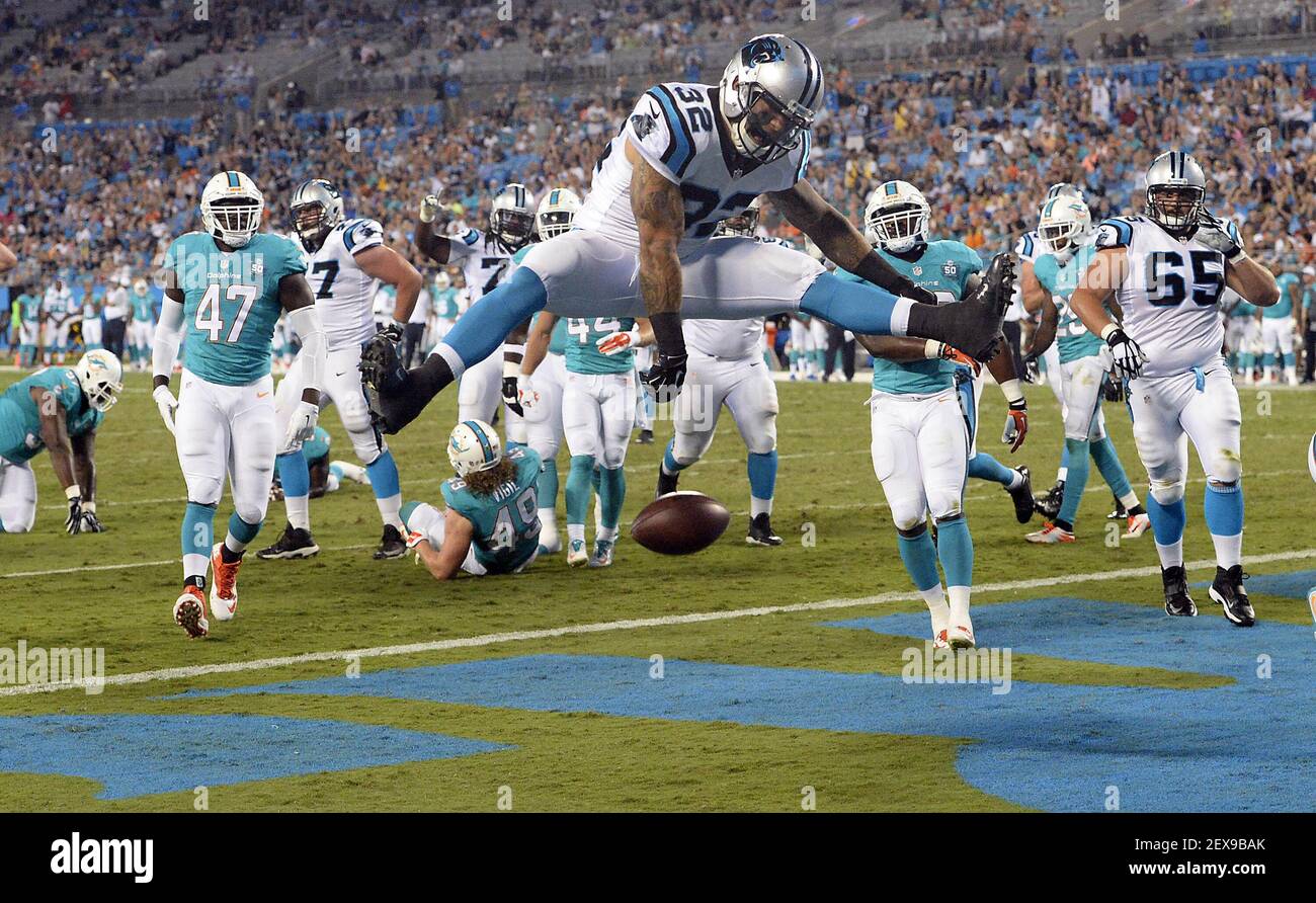 The Carolina Panthers' Brandon Wegher (32) scores a touchdown past the ...